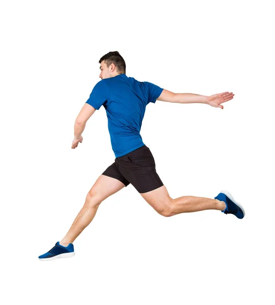 Спортсмен, прыгающий через воображаемое препятствие, изолированное на белой спине — стоковое фото