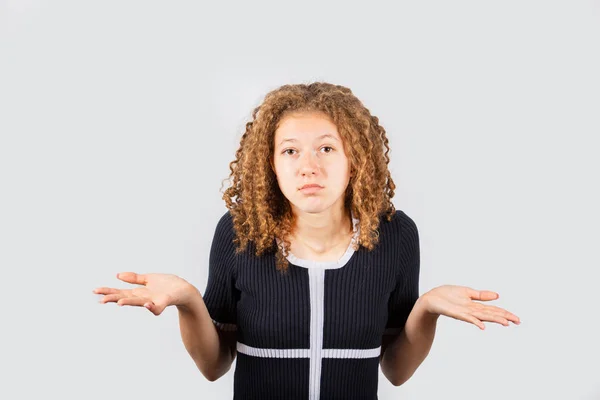 Confused young girl — Stock Photo, Image