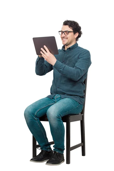 Contented Young Male Student Seated Chair Using Tablet Entertaining Modern — Stock Photo, Image