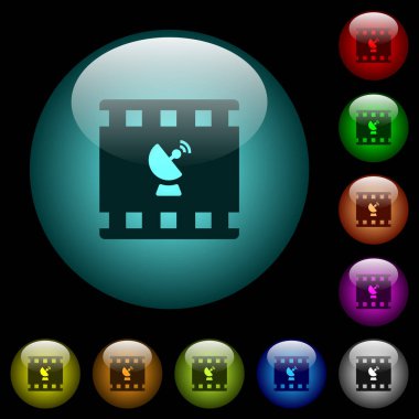 Film yayın simgeler renkli küresel cam düğmeler siyah arka plan aydınlatılmış. Siyah veya koyu şablonları için kullanılabilir