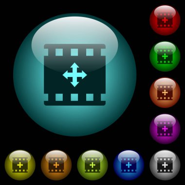Film simgeler siyah arka plan üzerinde renkli ışıklı küresel cam düğmeleri taşıyın. Siyah veya koyu şablonları için kullanılabilir