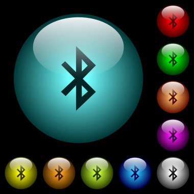 Renkli ışıklı küresel cam düğmeler siyah arka plan üzerine Bluetooth simgeler. Siyah veya koyu şablonları için kullanılabilir
