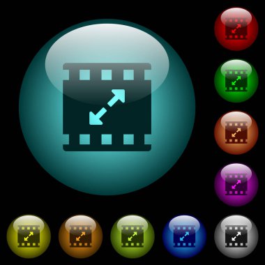 Filmi yeniden boyutlandırma renk ışıklı küresel cam düğmeleri siyah arka plan üzerine büyük simgeler. Siyah veya koyu şablonları için kullanılabilir