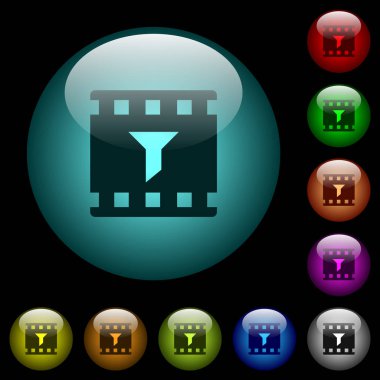 Film simgeler siyah arka plan üzerinde renkli ışıklı küresel cam düğmeleri filtre. Siyah veya koyu şablonları için kullanılabilir