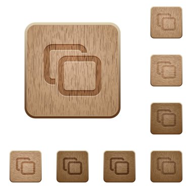 Yuvarlak kare oyulmuş ahşap düğme biçimleri üzerindeki sekmeler