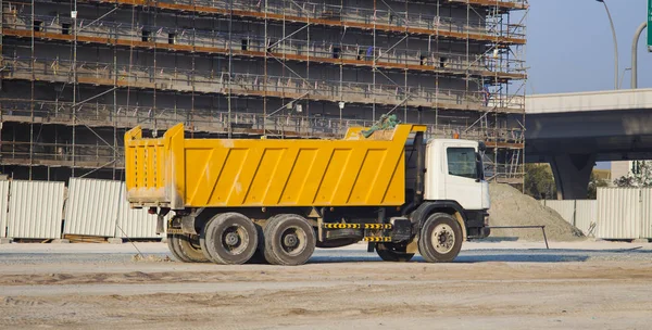 truck and building under construction. Dubai city