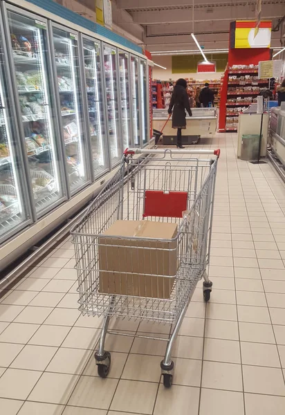 shopping cart with box in the supermarket