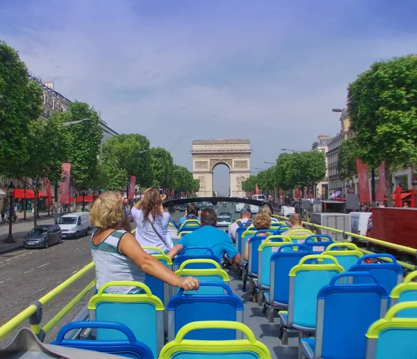 tourist bus in Paris France. Champs Elysees boulevard in summer