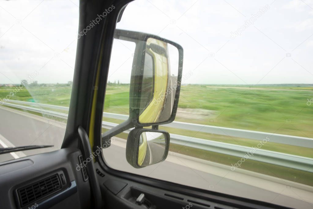 truck interior driving. view of mirrors and window