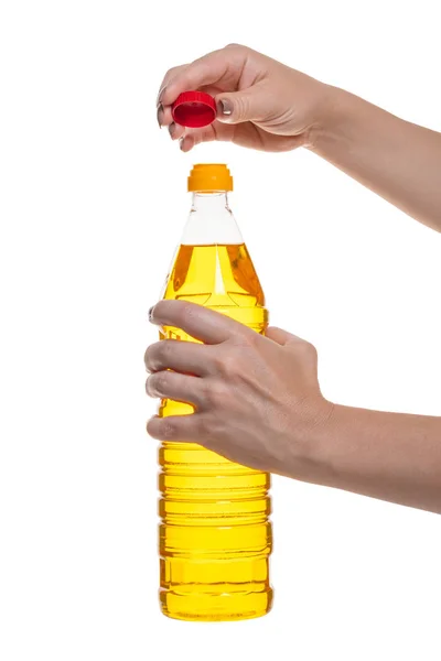 Flaska Med Vegetabilisk Olja Handen Vit Isolerade Bakgrund — Stockfoto