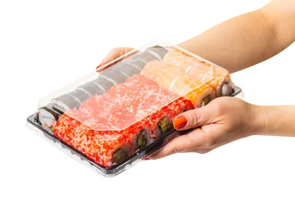 Zestaw Sushi trzymać ręce — Zdjęcie stockowe
