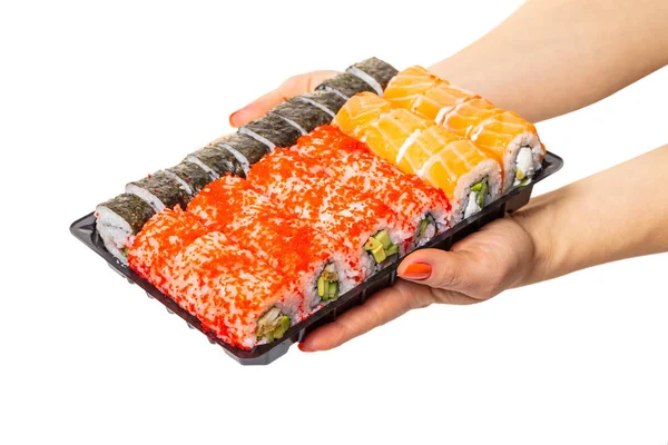Sushi set segurar as mãos — Fotografia de Stock
