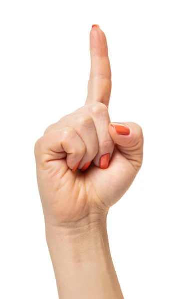 Female hand with raised index finger — Stock Photo, Image