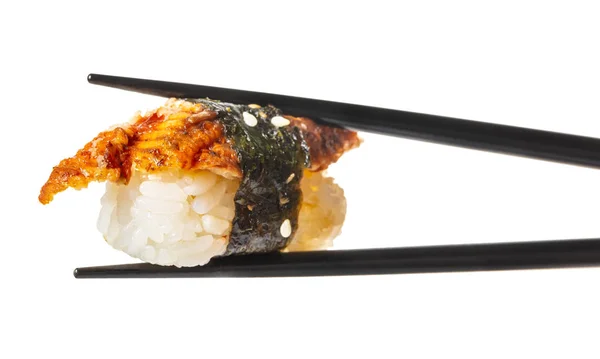 Stokken houden sushi — Stockfoto