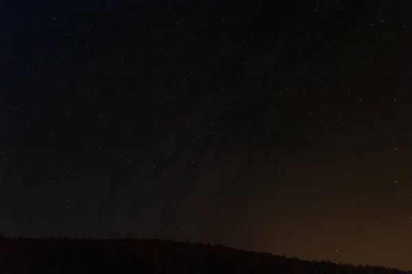 Night sky with stars, milky way and forest, Czech landscape — Stock Photo, Image