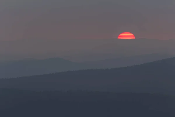 Detail of sunset with distant hill from Tristolicnik. Outdoor an — Stock Photo, Image