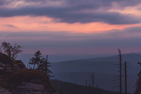 Sunset with distant hill and dead tree from Tristolicnik. Blue h — Stock Image Sunset with distant hill and dead tree from Tristolicnik. Blue h Stock Picture