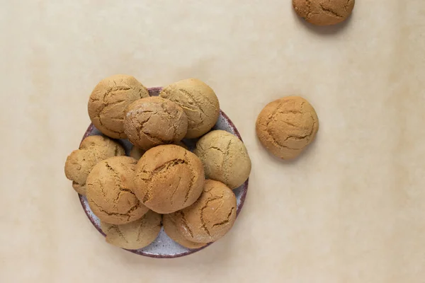 Homemade oatmeal cookies on kraft baking paper