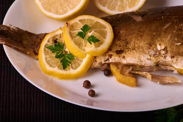 Baked Fish Lemon Spices Herbs White Plate Wooden Background — Stock Photo, Image