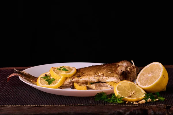 Appetizing Baked Fish Covered Juicy Lemons Garlic Salt Side — Stock Photo, Image