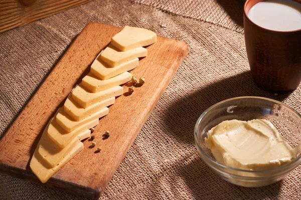 Slices Cheese Wooden Desk Butter Milk — Stock Photo, Image