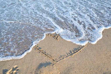 Sevgi sahil kumu - tatil iletide ve concep seyahat