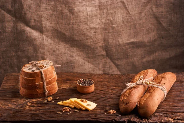 Breads concept of teasty home food close up on wooden background — Stock Photo, Image