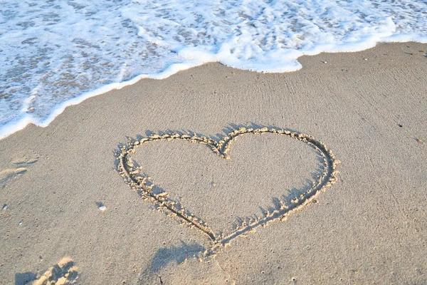 Love message on the beach sand - vacation and travel concep Royalty Free Stock Images