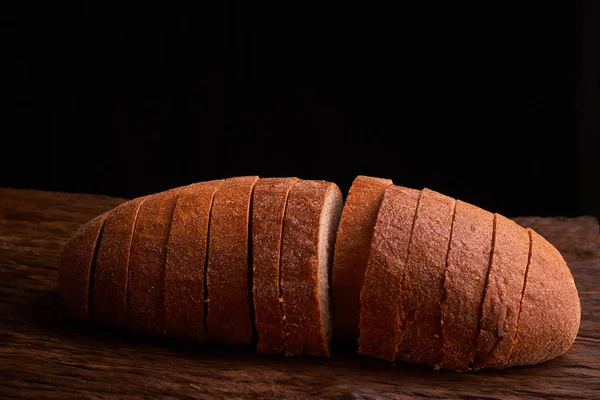 Μοντέρνο και ανακαινισμένο σπίτι διατροφική αντίληψη ψωμιά Κλείστε επάνω σε φόντο ξύλινη — Φωτογραφία Αρχείου