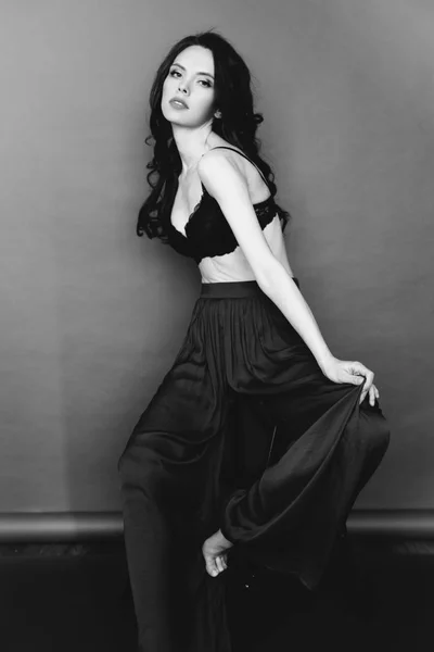 Fashion art studio black and white portrait of beautiful girl