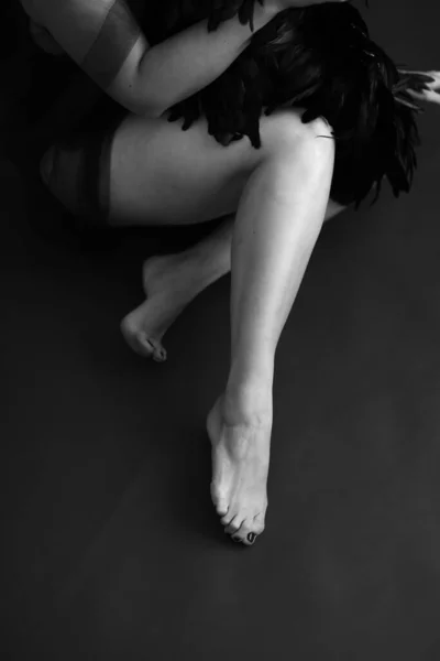 stock image Fashion art studio black and white portrait of beautiful girl, black feathers and female body