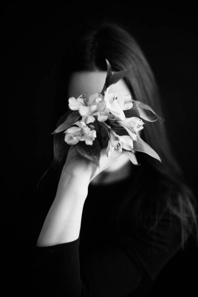 Black and white art fashion surrealistic portrait of beautiful woman,details of body black and white portrait of beautiful girl,fashion and art,portrait with plants and flowers