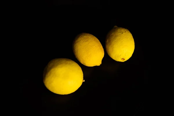 fresh lemon on black background