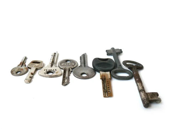 Keys, keys, antique keys, vintage keys, keys, white keys, close-up, white background, different keys, gray keys, bronze keys, steel keys, lots of keys, Soviet vintage, USSR, Soviet keys, headstock stock image, Nostalgishop