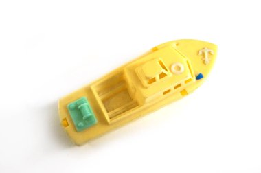 Sarı tekne, çocuk bot, plastik tekne, sarı tekne, çocuk tekne, plastik tekne, tekne oyuncak, oyuncak tekne, parlak sarı, sarı beyaz, yakın çekim, beyaz arka plan, Sovyet vintage, SSCB, eski oyuncak, sap kafası hisse senedi resim, Nostalgishop