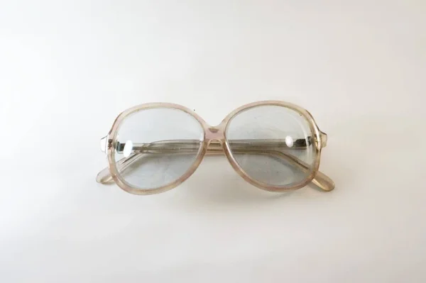 Glasses, Eyeglass frames, Plastic frame, Soviet eyeglass frames, Vintage eyeglass frames, USSR glasses, Old glasses, Transparent, White background, Close-up, Antique glasses, Soviet olden, Grandmother glasses, Optics, headstock stock image, Nostalg