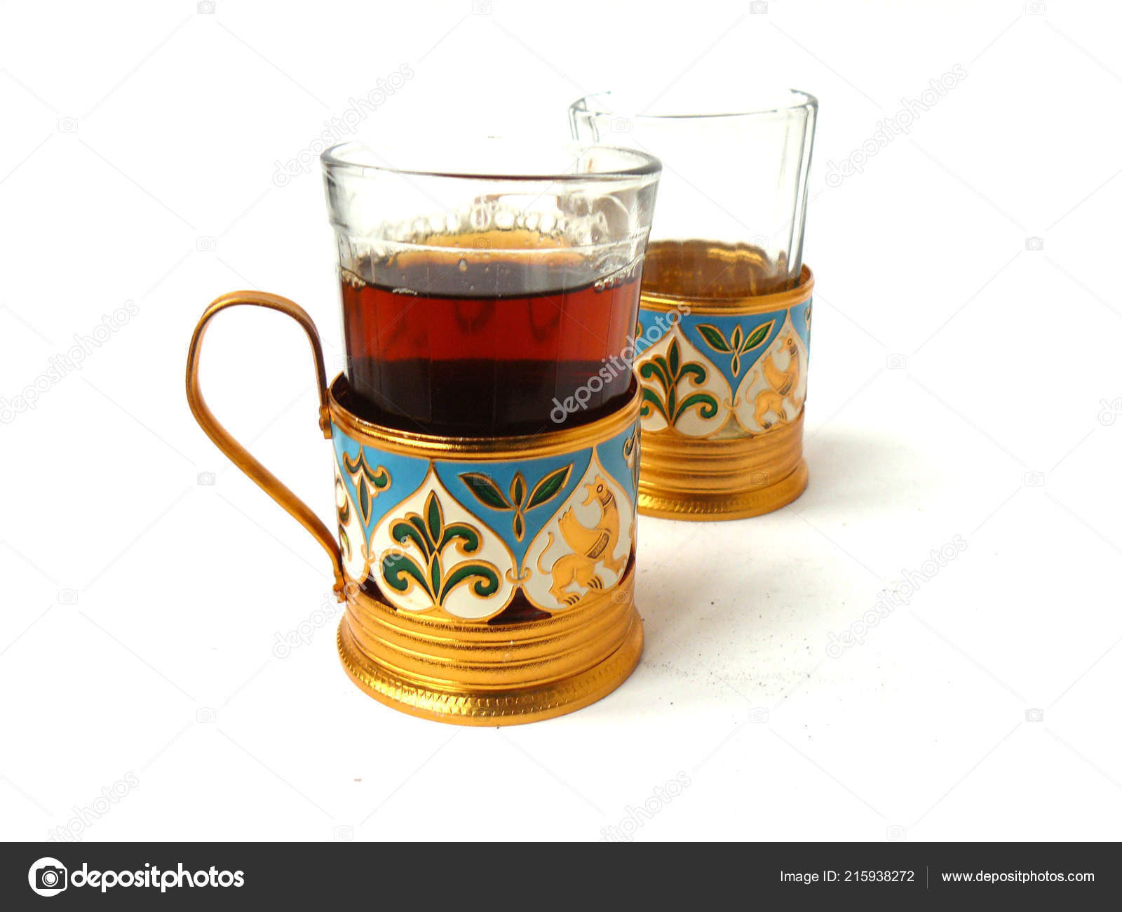 glass and metal tea cups