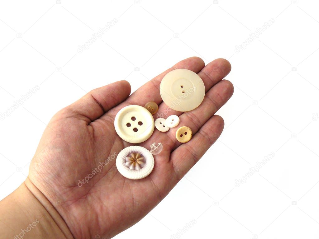 Buttons in hand, Button Set, Vintage Buttons, Multicolored Buttons, Old Buttons, Soviet Buttons, USSR, Soviet Vintage, Bright Set, White Background, Close-Up, Sewing, For Sewing, Tailor, Headstock stock image, Nostalgishop