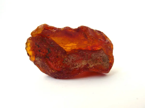 Amber, Natural stone, Orange stone, Nugget, Orange on white, Raw stone, Jewelry stone, White background, Close-up, Headstock stock image, Nostalgishop