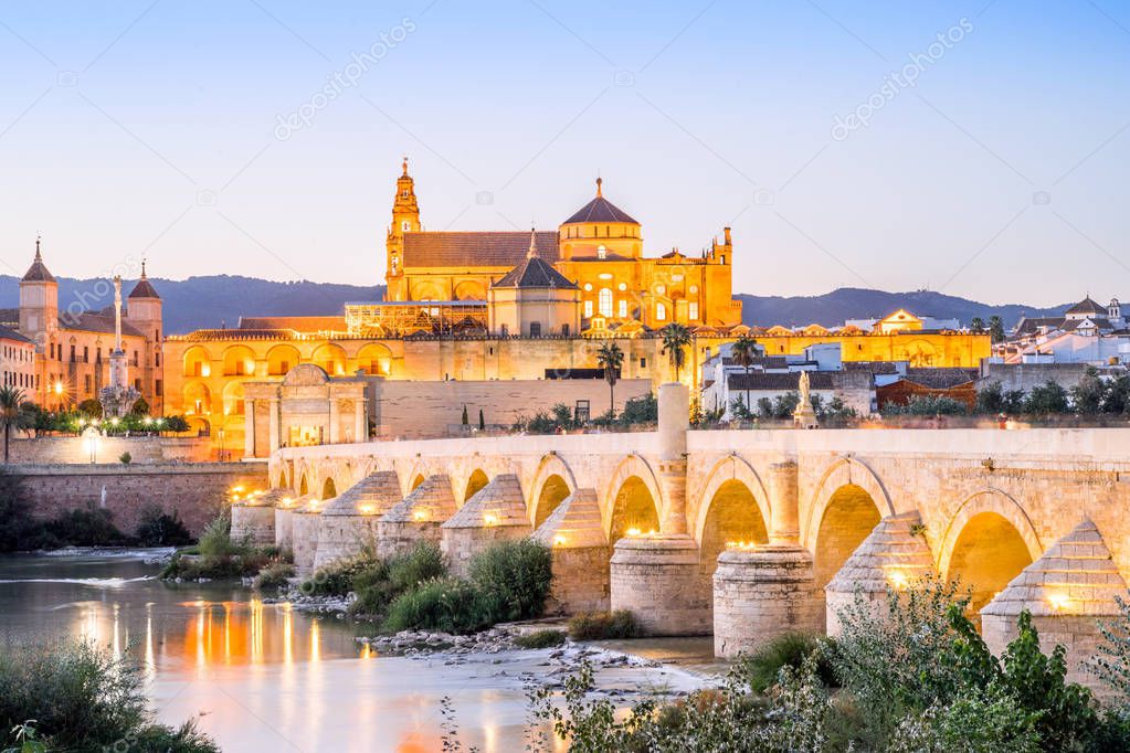 Roman bridge and cathedral - mosque as landmarks of Cordoba, Andalusia, Spain