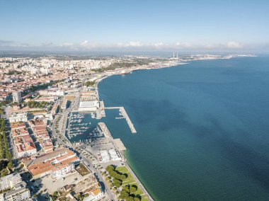 Aerial view of Setubal city with marina by Atlantic Ocean, Portugal clipart