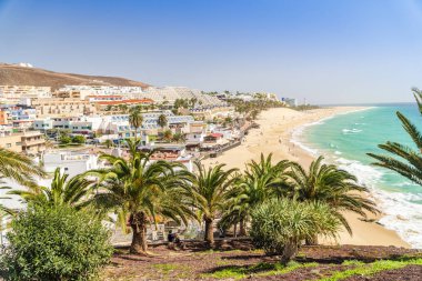 Beautiful, wide sandy beach in Morro Jable, Fuerteventura, Spain clipart