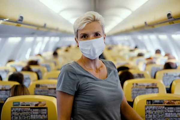 Woman Airplane Protective Mask Surrounded Many Sitting People — Stock Photo, Image