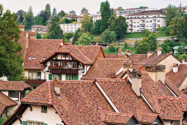 Bern, Switzerland - August 31, 2016: Rooftops of old houses in Bern, Switzerland.