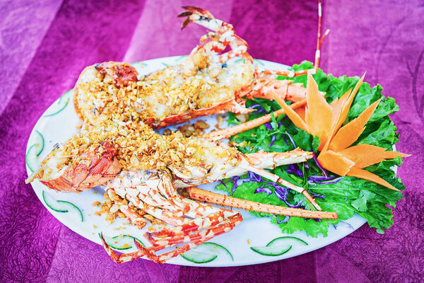 Лобстер на тарелке в Дананге, Вьетнам
