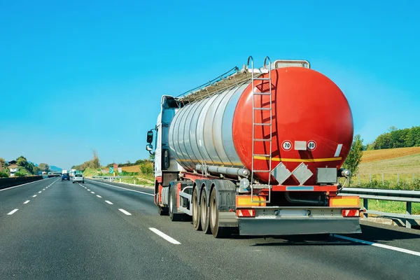 Truck tanker in the road in Italy. Lorry transport delivering some freight cargo.