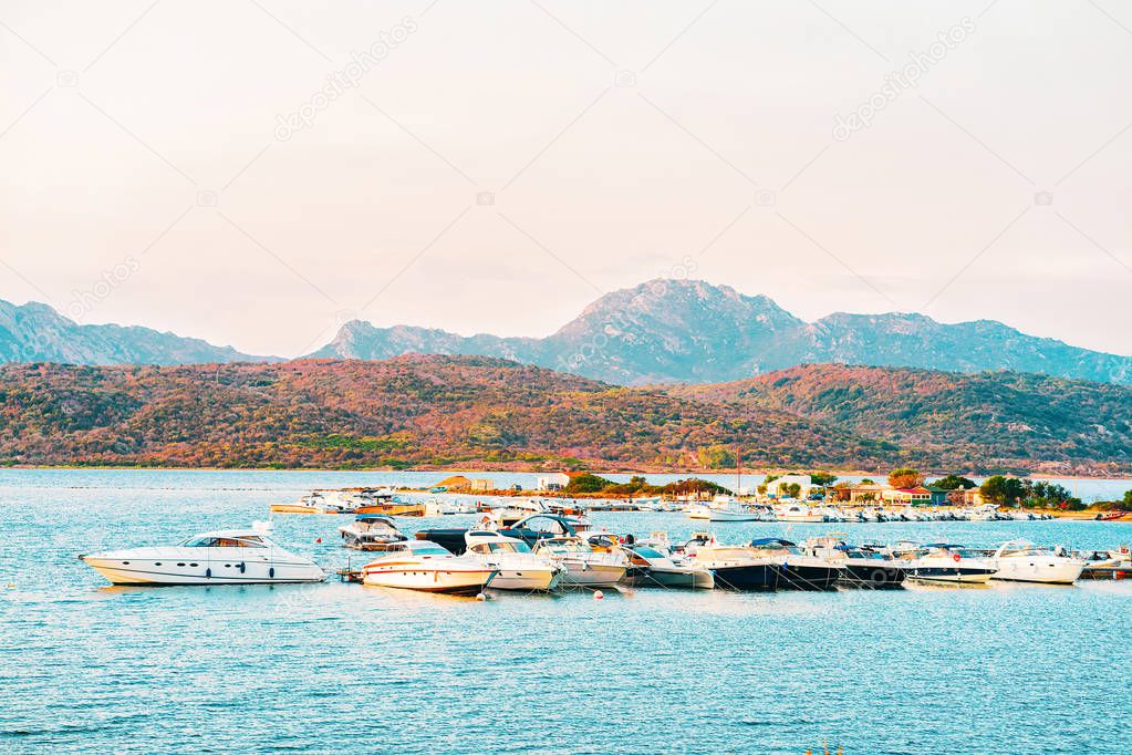 Yachts on the Mediterranean Sea on Costa Smeralda in Sardinia in Italy at sunrise