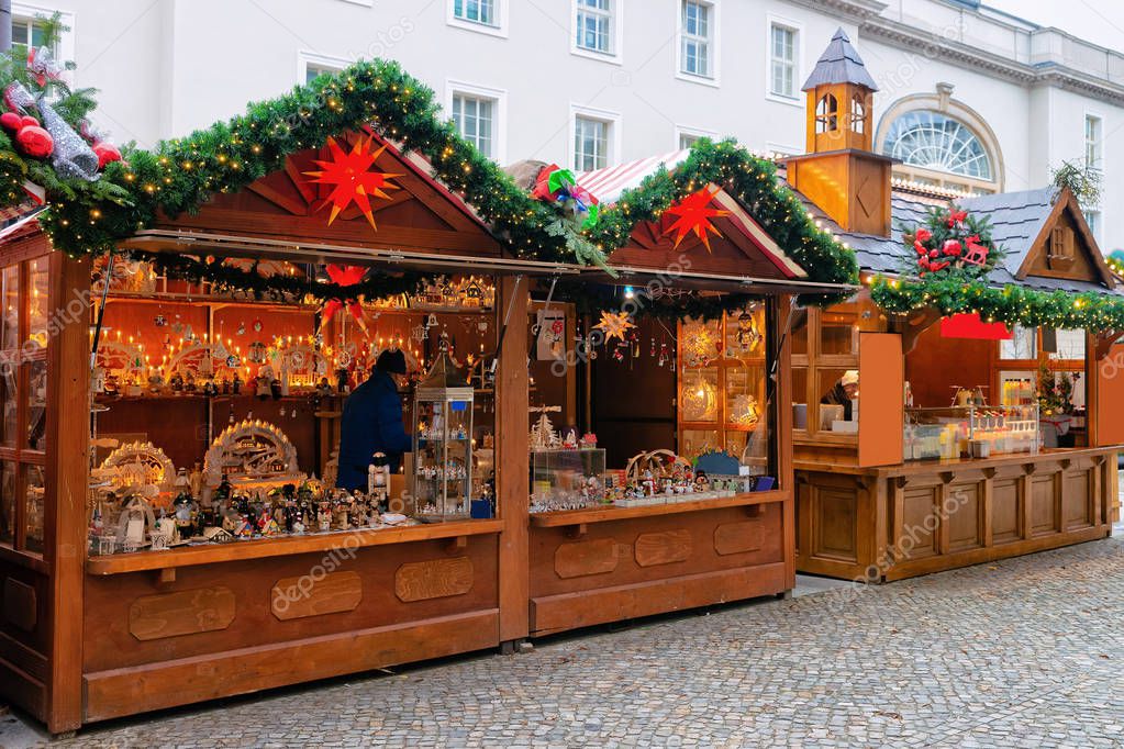 Christmas Market in Opernpalais at Mitte in Winter Berlin, Germany. Advent Fair Decoration and Stalls with Crafts Items on the Bazaar.