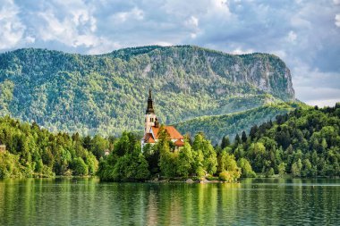 Beautiful scenery with Church in the middle of the Bled Lake, Slovenia clipart