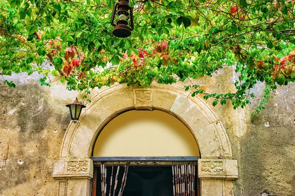 Entrance door at the bar in Savoca, Sicily island, Italy.